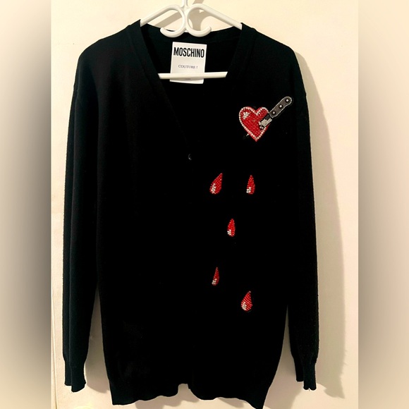 The cardigan is decorated with crystals. - Picture 2 of 2